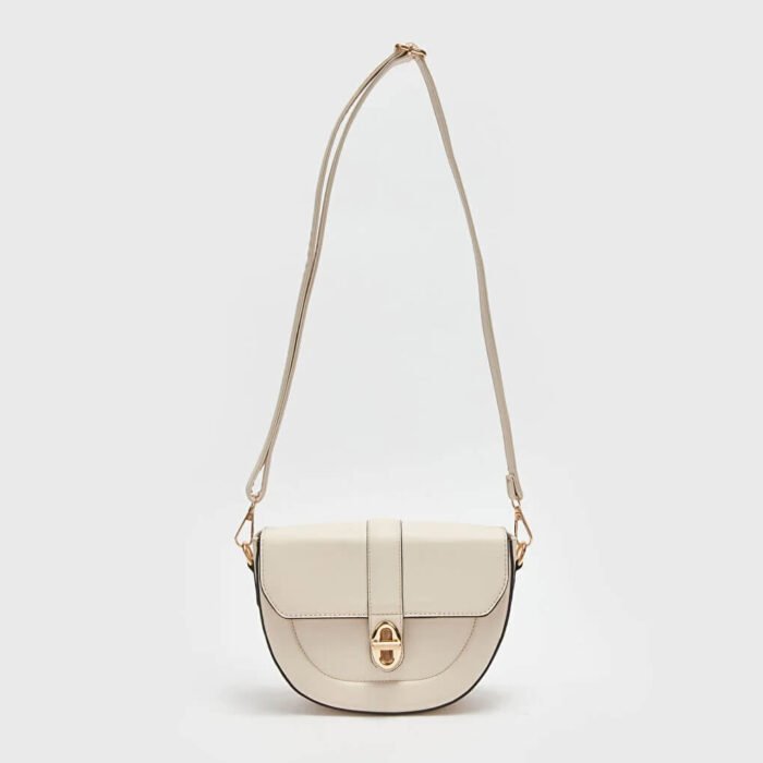 حقيبة يد نسائية من الجلد المزخرف بأشرطة